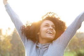 o-BLACK-WOMAN-HAPPY-OUTSIDE-facebook-272x182